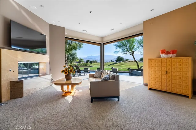 a bathroom with a granite countertop sink a mirror and shower