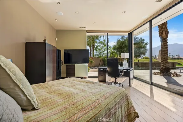 a bed room with a bed and a couch