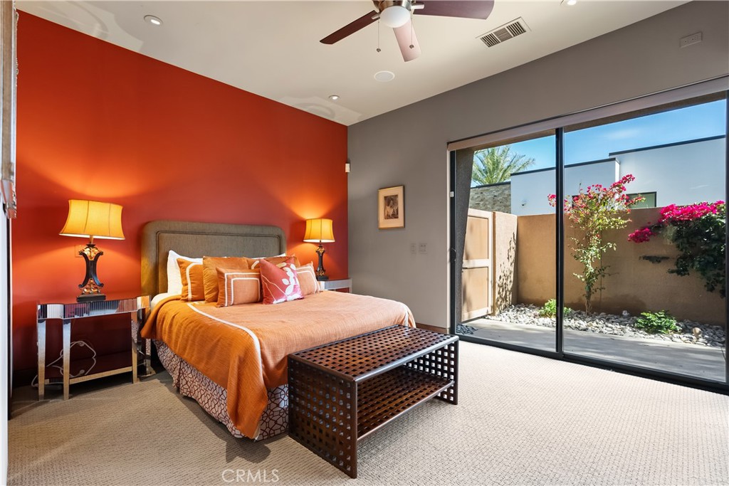 68 Royal St Georges Way Rancho Mirage, CA 92270 - Photo 35 of 73 a bedroom with a bed and window