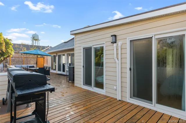 a view of a dinning tables and chairs in the balcony