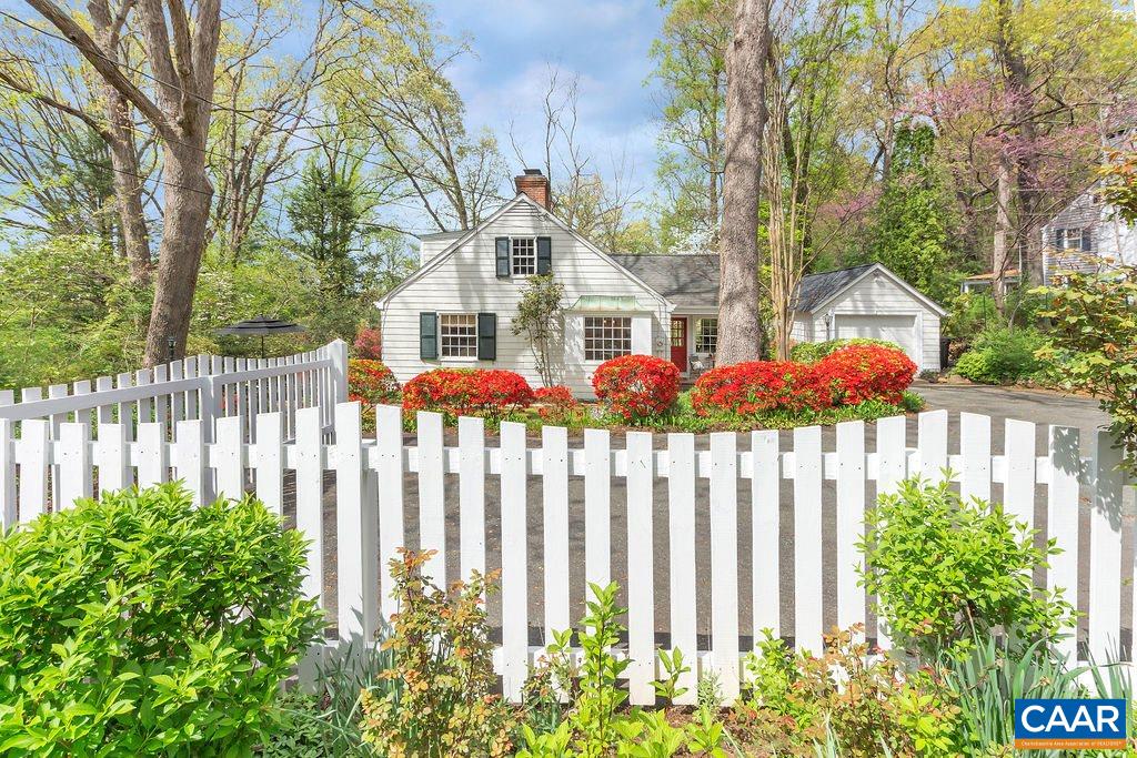 1426 Dairy Road Charlottesville, VA 22903 - Photo 3 of 48 a front view of house and garden with flower plants