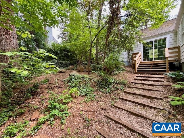 1426 Dairy Road Charlottesville, VA 22903 - Photo 33 of 48 a view of a yard with plants and trees
