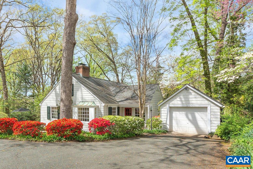 1426 Dairy Road Charlottesville, VA 22903 - Photo 43 of 48 a front view of a house with a yard and potted plants