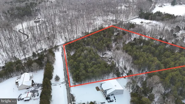 a view of swimming pool and red umbrella