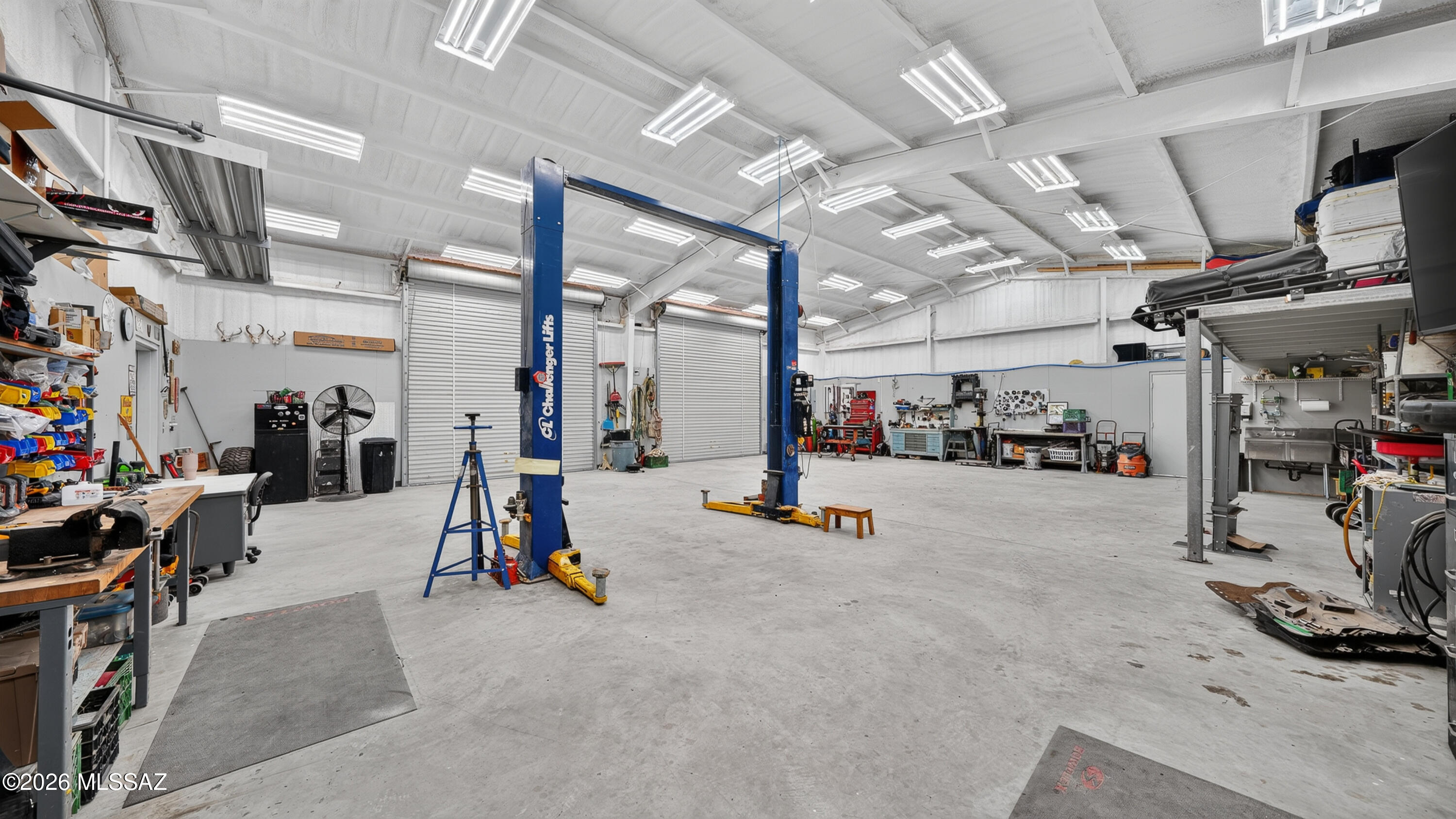 194 Taylor Road Willcox, AZ 85643 - Photo 41 of 54 10,000 lb 2 post Challenger Lift, 25x8' steel Framed Loft, 6" Concrete Slab
