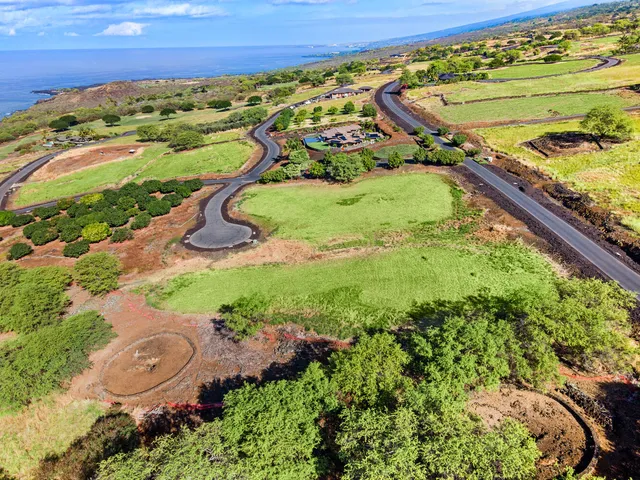 a view of a yard with an ocean