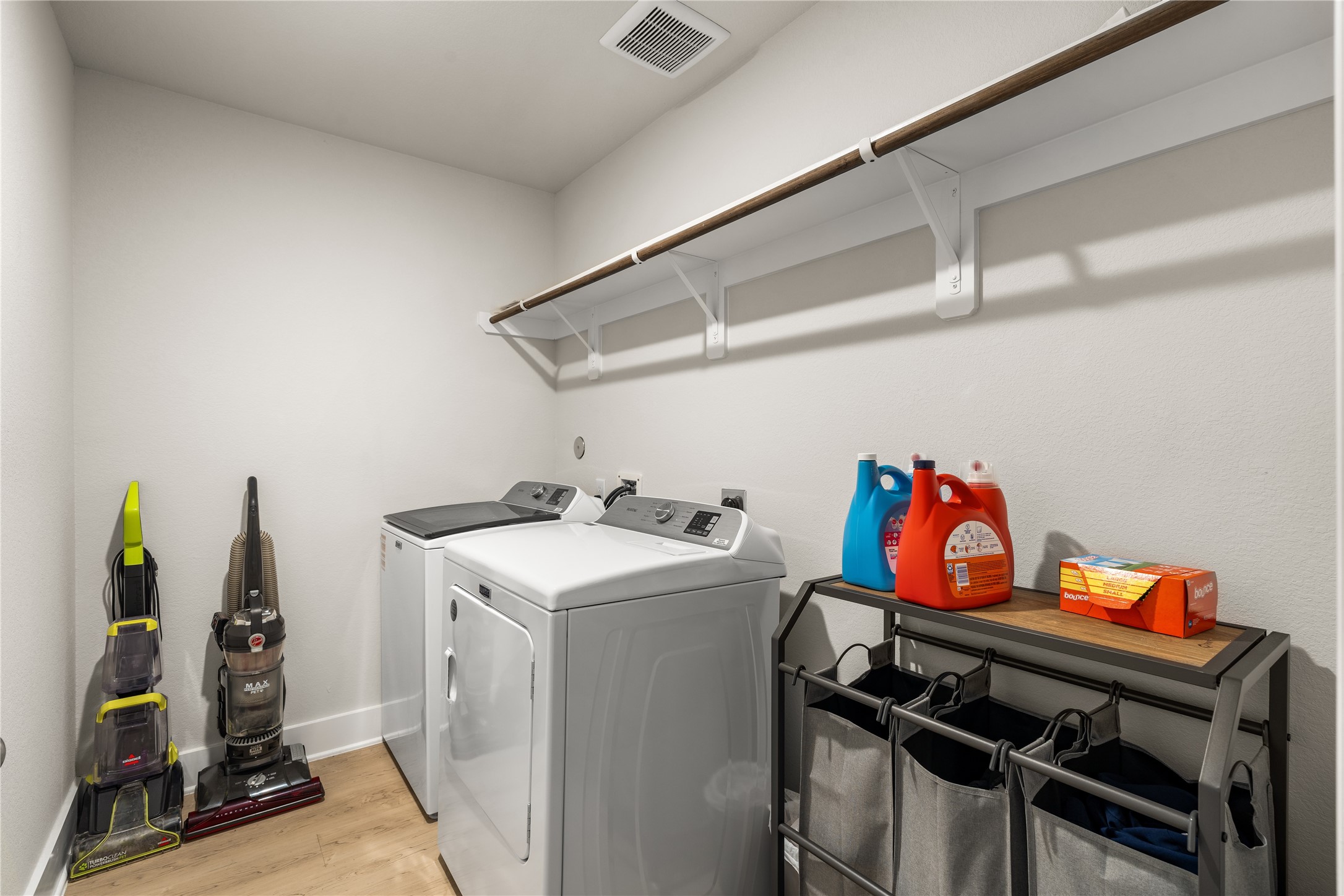 4001 Baja Lane Houston, TX 77045 - Photo 25 of 27 Thoughtfully tucked away from the main living areas, the dedicated laundry room offers ample space for sorting, storage, and keeping everyday tasks organized.