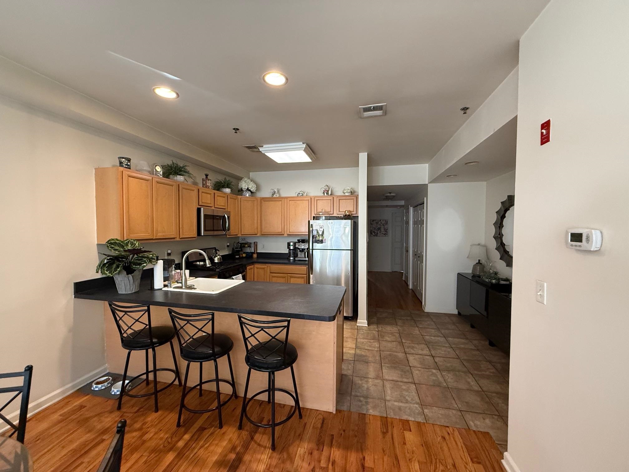 608 Jefferson Street, Unit 3 Hoboken, NJ 07030 - Photo 5 of 14 a view of a dining room with furniture