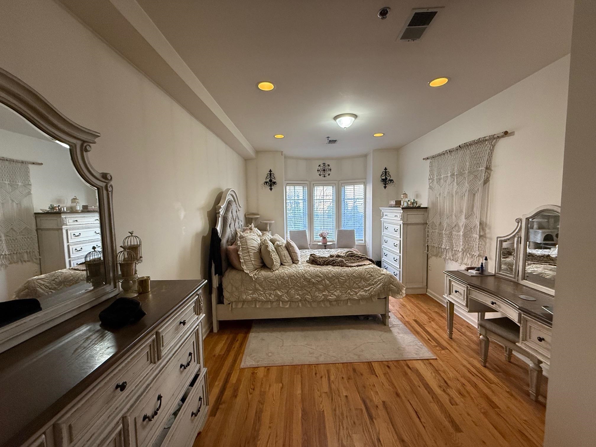 608 Jefferson Street, Unit 3 Hoboken, NJ 07030 - Photo 7 of 14 a living room with furniture and a wooden floor