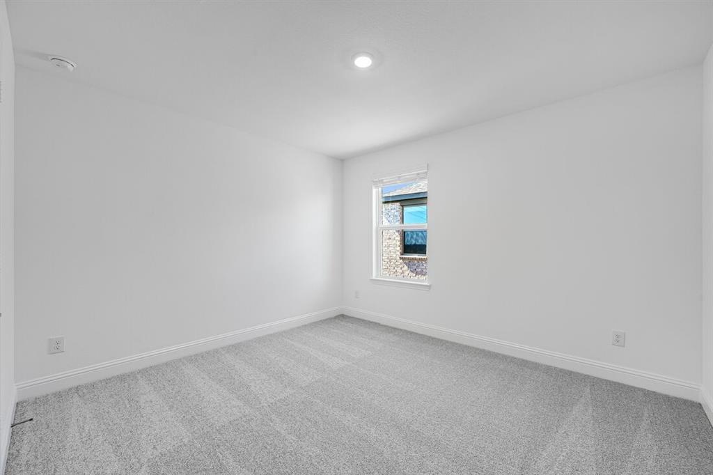 1429 Arciones Road Fort Worth, TX 76052 - Photo 16 of 39 an empty room with a window