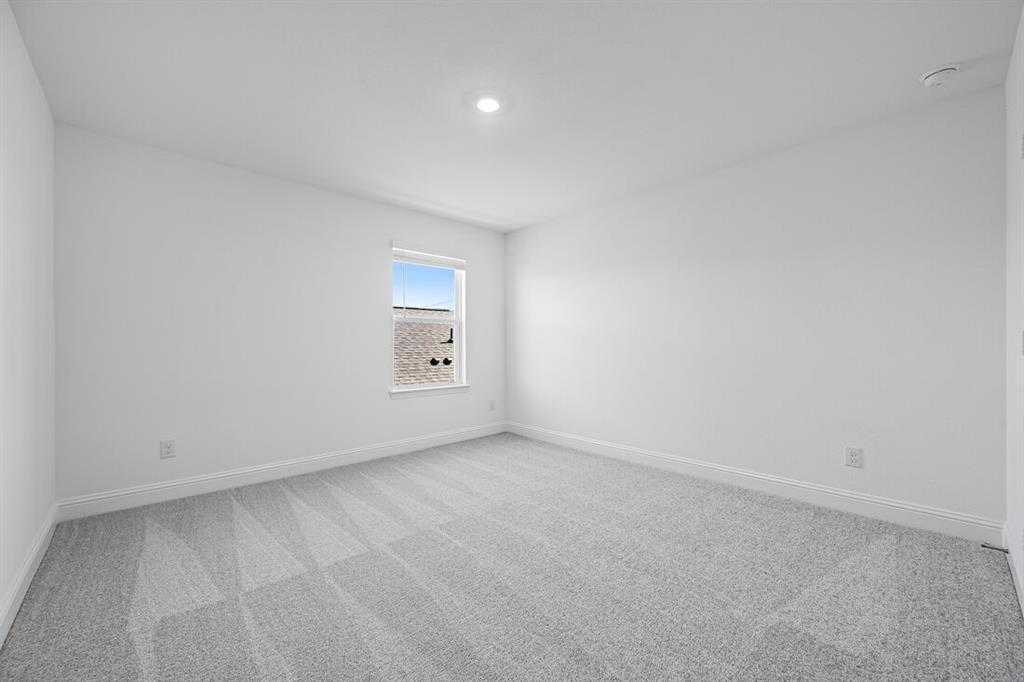 1429 Arciones Road Fort Worth, TX 76052 - Photo 17 of 39 a view of an empty room