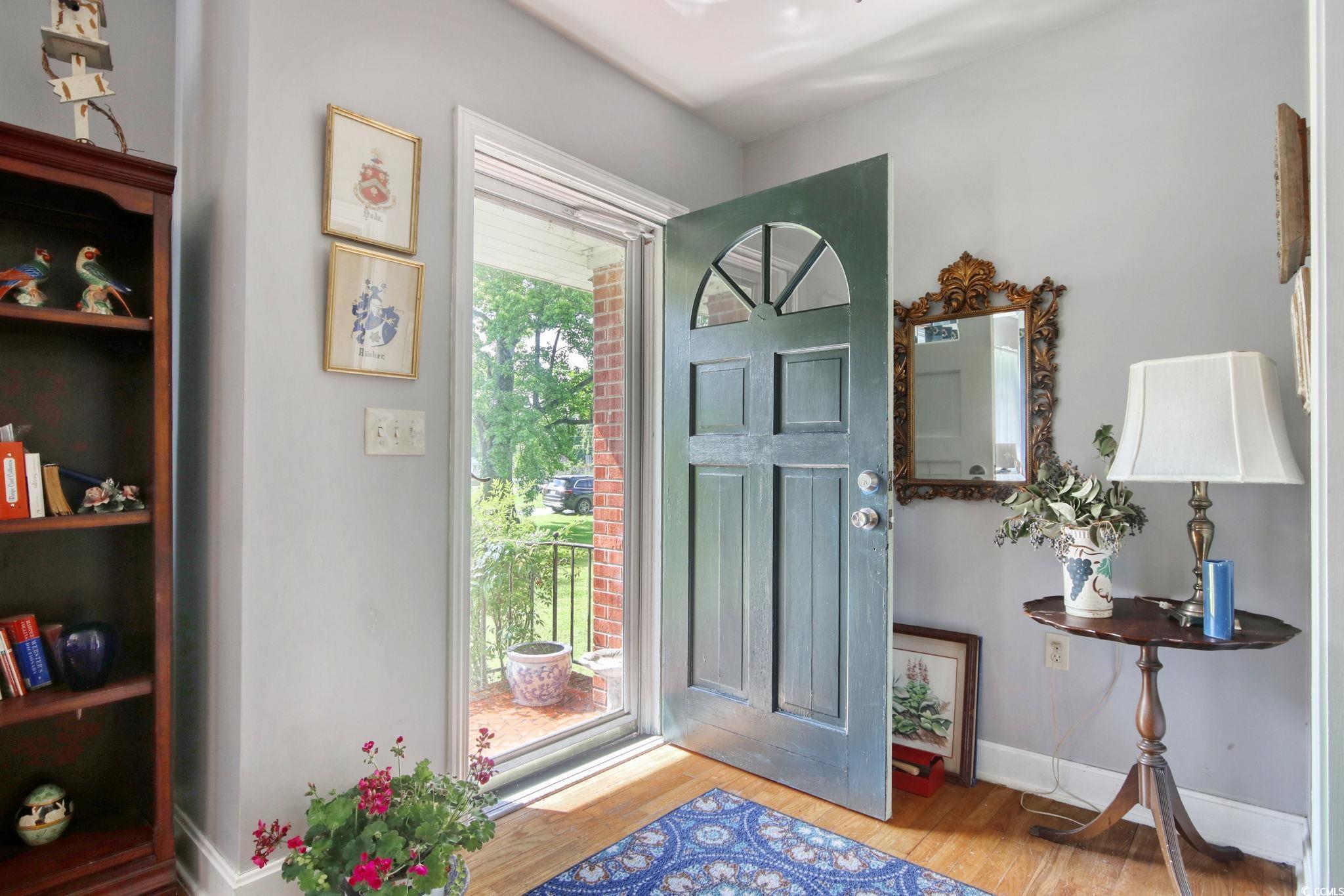 2004 Seitter Street Georgetown, SC 29440 - Photo 6 of 33 Entrance foyer with wood finished floors and baseboards
