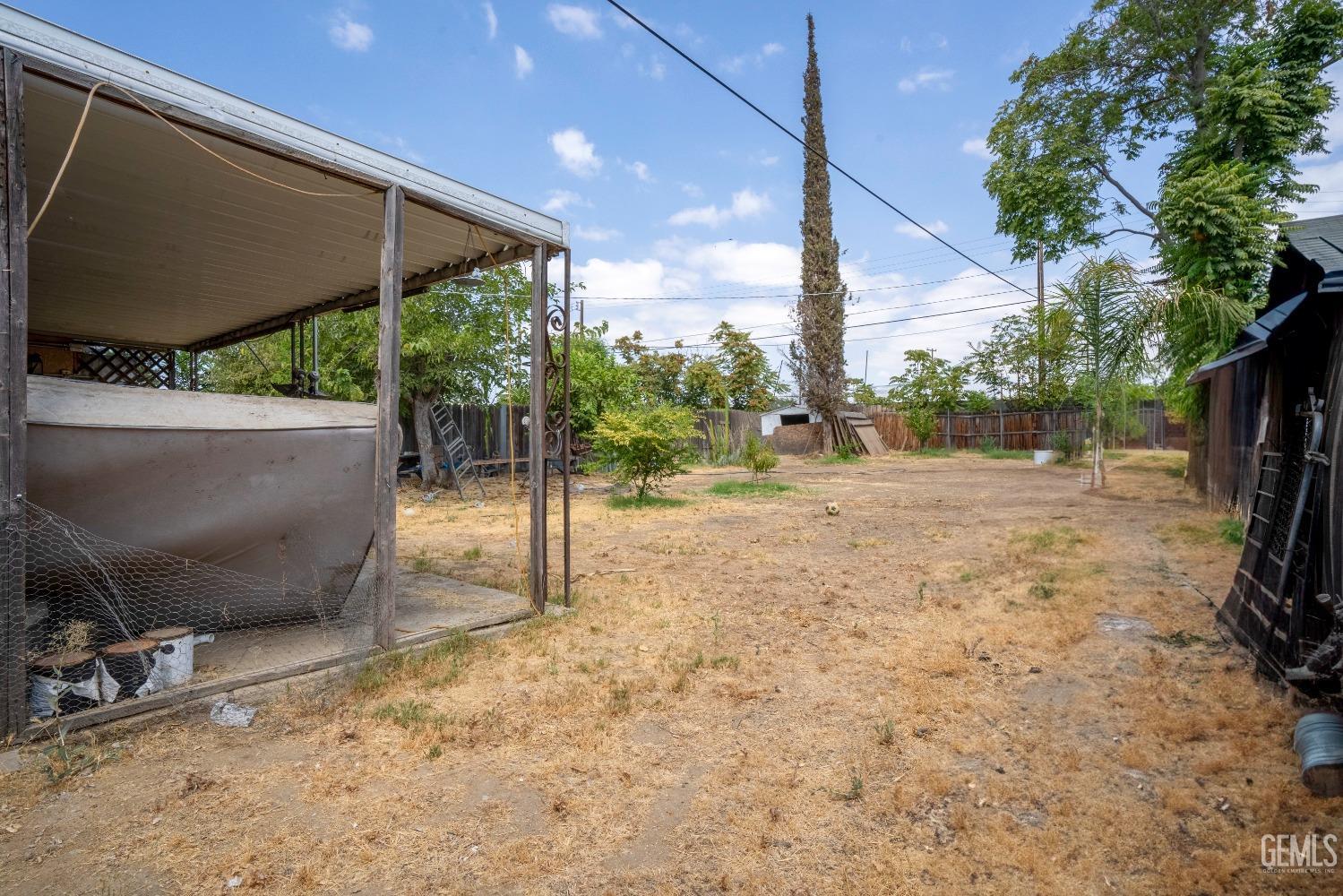 Undisclosed Address Bakersfield, CA 93305 - Photo 20 of 23 a view of backyard with green space