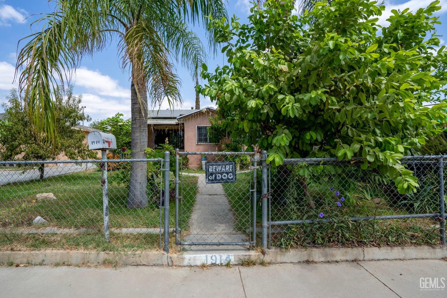 Undisclosed Address Bakersfield, CA 93305 - Photo 2 of 23 a view of a house with a park