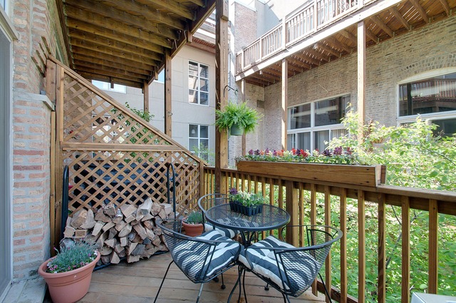 525 North Ada Street, Unit 27 Chicago, IL 60642 - Photo 16 of 18 a view of a balcony with chairs