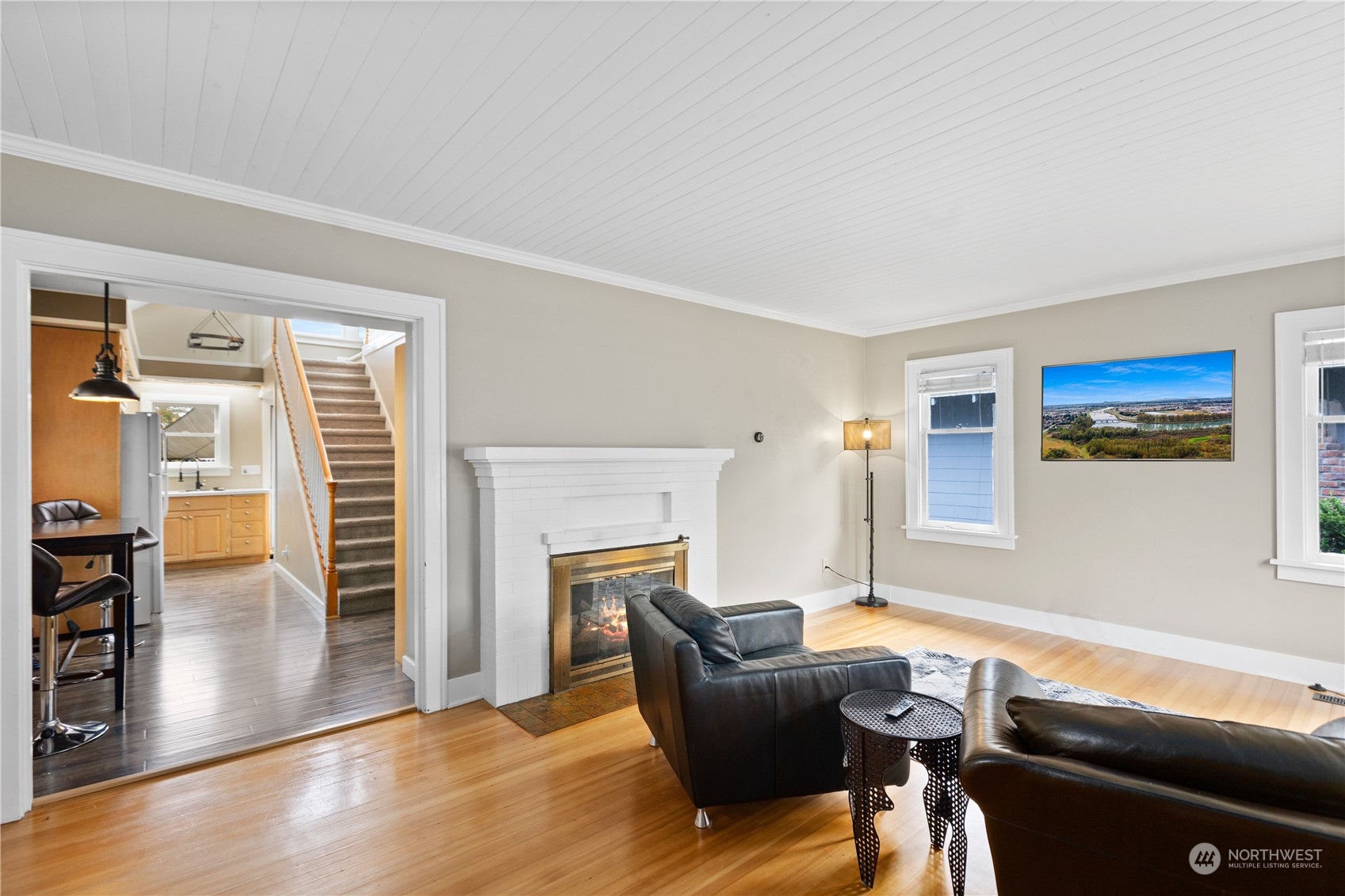 3215 Rockefeller Avenue Everett, WA 98201 - Photo 5 of 31 a living room with furniture and a fireplace