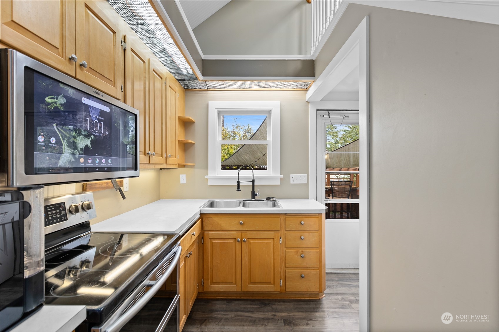 3215 Rockefeller Avenue Everett, WA 98201 - Photo 9 of 31 a kitchen with a stove and a sink