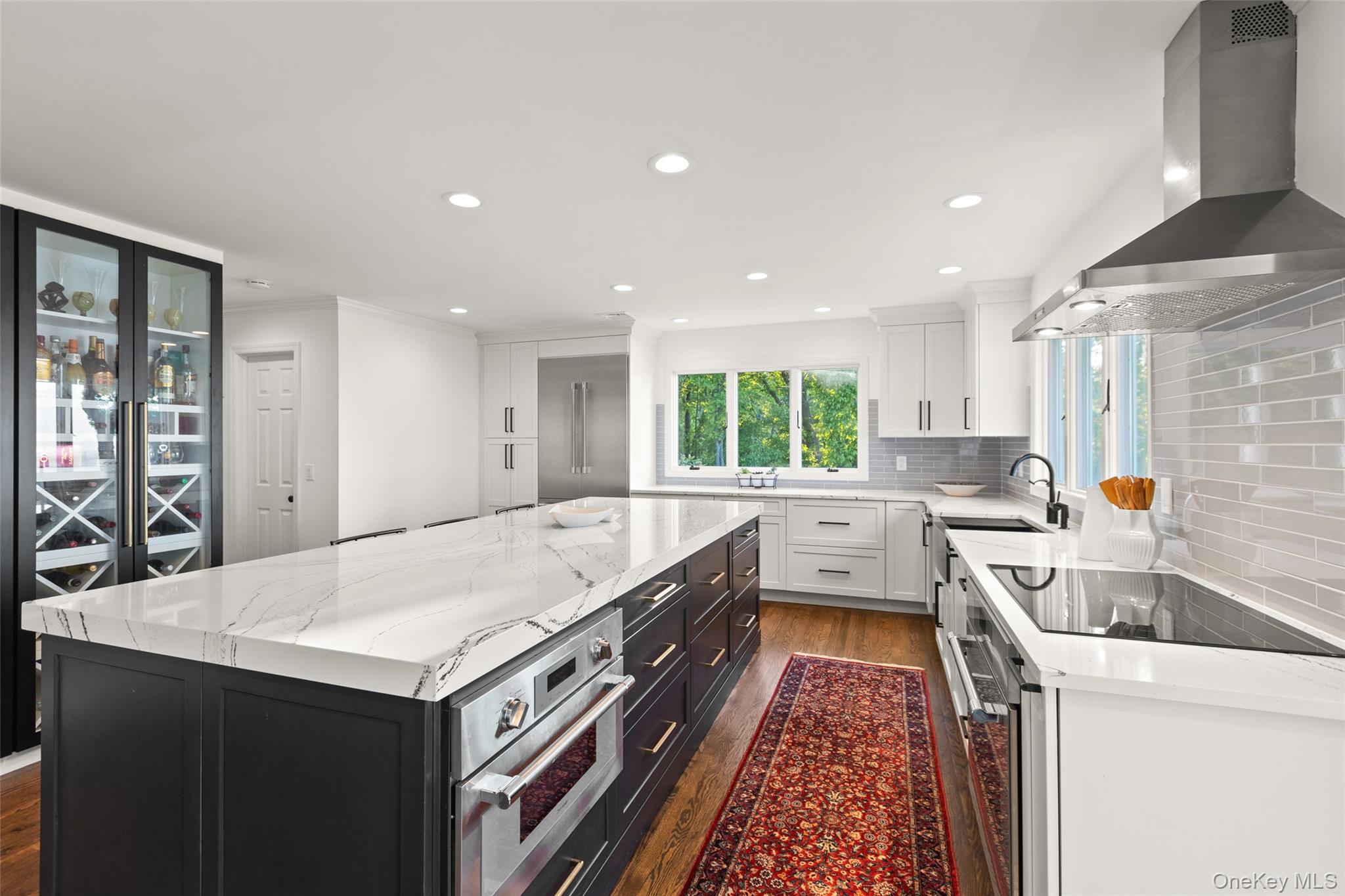 15 Stephens Path Port Jefferson, NY 11777 - Photo 12 of 34 a kitchen with a stove sink and a refrigerator