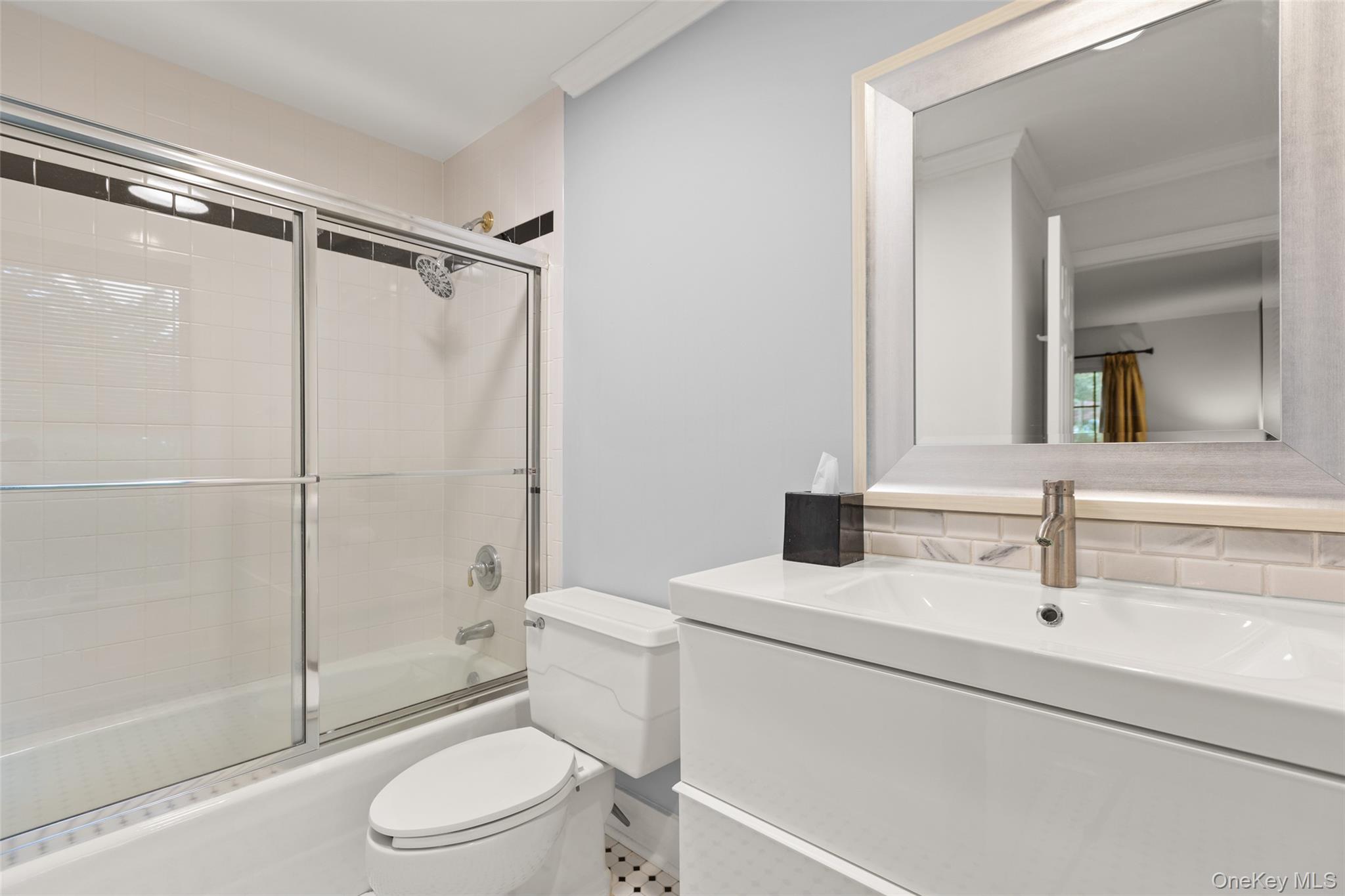 15 Stephens Path Port Jefferson, NY 11777 - Photo 19 of 34 a bathroom with a sink toilet and shower