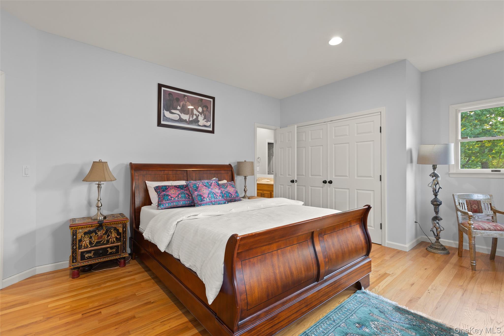 15 Stephens Path Port Jefferson, NY 11777 - Photo 25 of 34 a bedroom with a bed and a table