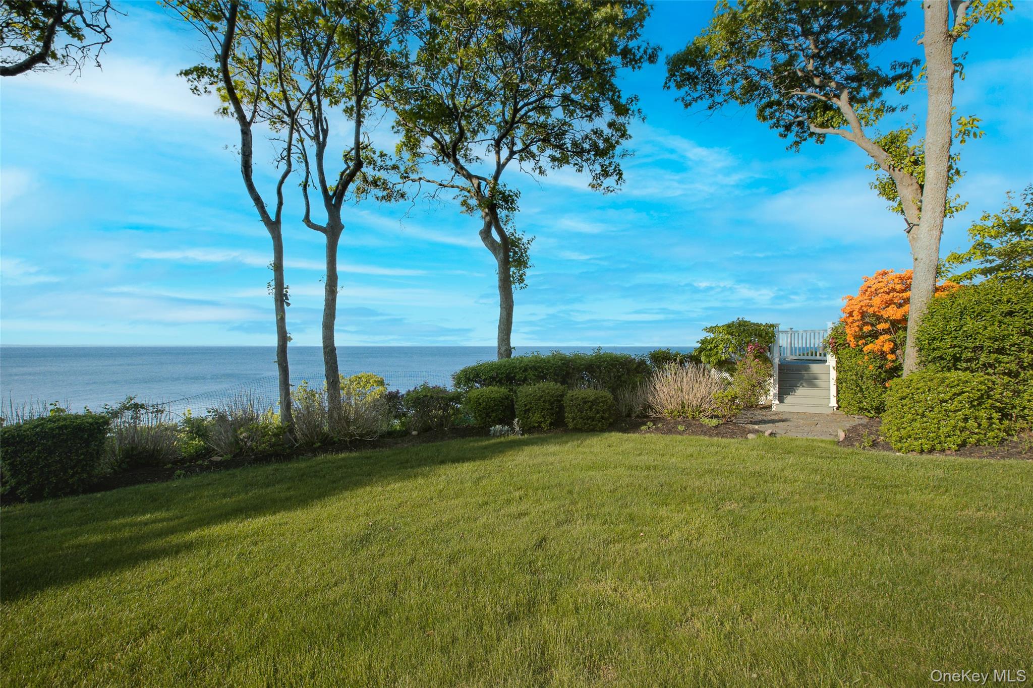 15 Stephens Path Port Jefferson, NY 11777 - Photo 30 of 34 a view of a garden with an ocean