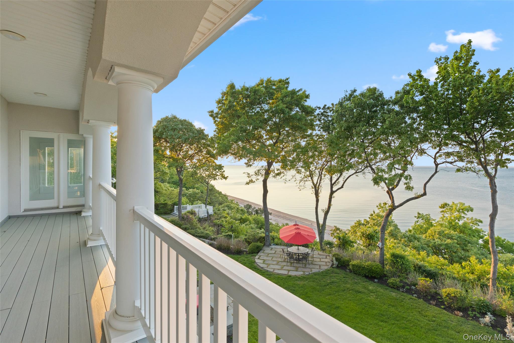 15 Stephens Path Port Jefferson, NY 11777 - Photo 4 of 34 a view of a balcony with wooden fence