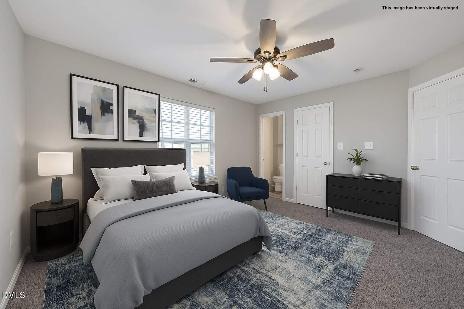 1601 Briarmont Court Raleigh, NC 27610 - Photo 22 of 30 a bedroom with a bed and window