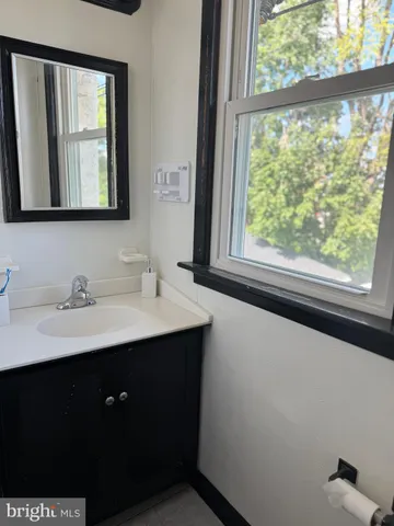 a bathroom with a bath tub and a shower