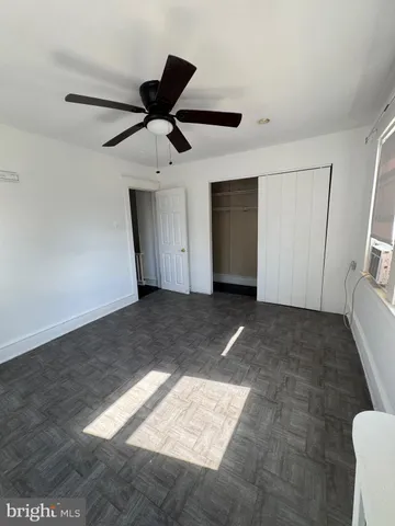 a view of empty room with windows