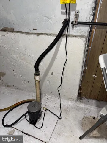 a room with lots of appliances and furniture