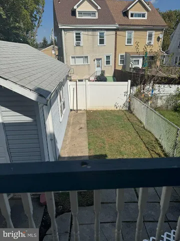 a view of a big yard next to a yard