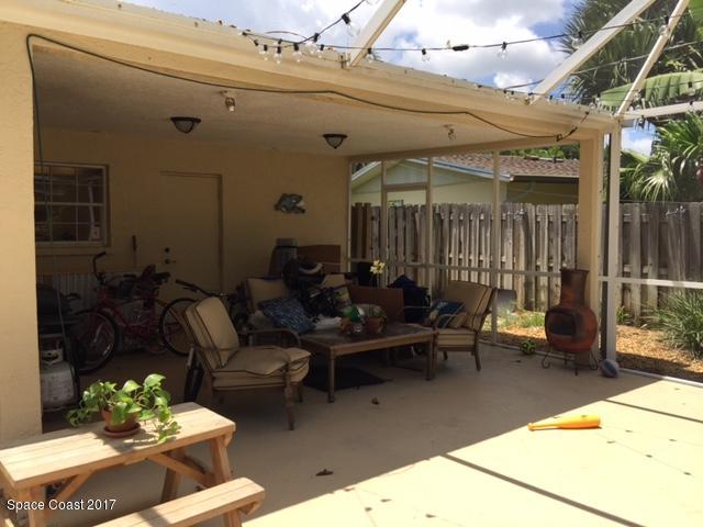 222 Brian Drive Indialantic, FL 32903 - Photo 13 of 14 a living room with furniture and wooden floor