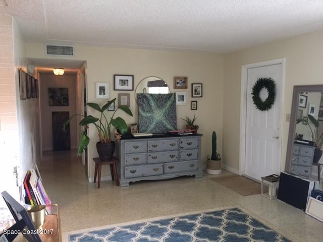 222 Brian Drive Indialantic, FL 32903 - Photo 4 of 14 a room with furniture and a bed