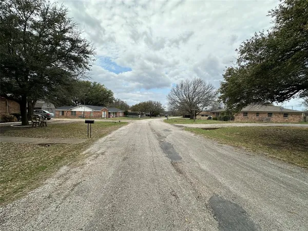 a view of swimming pool with a yard