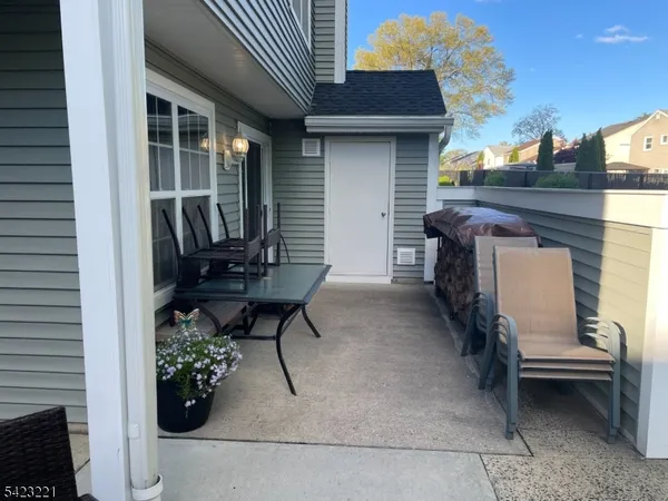 a view of a lounge chairs in the patio