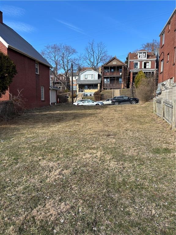 0 Ormsby Pittsburgh, PA 15210 - Photo 5 of 5 a front view of a house with a yard