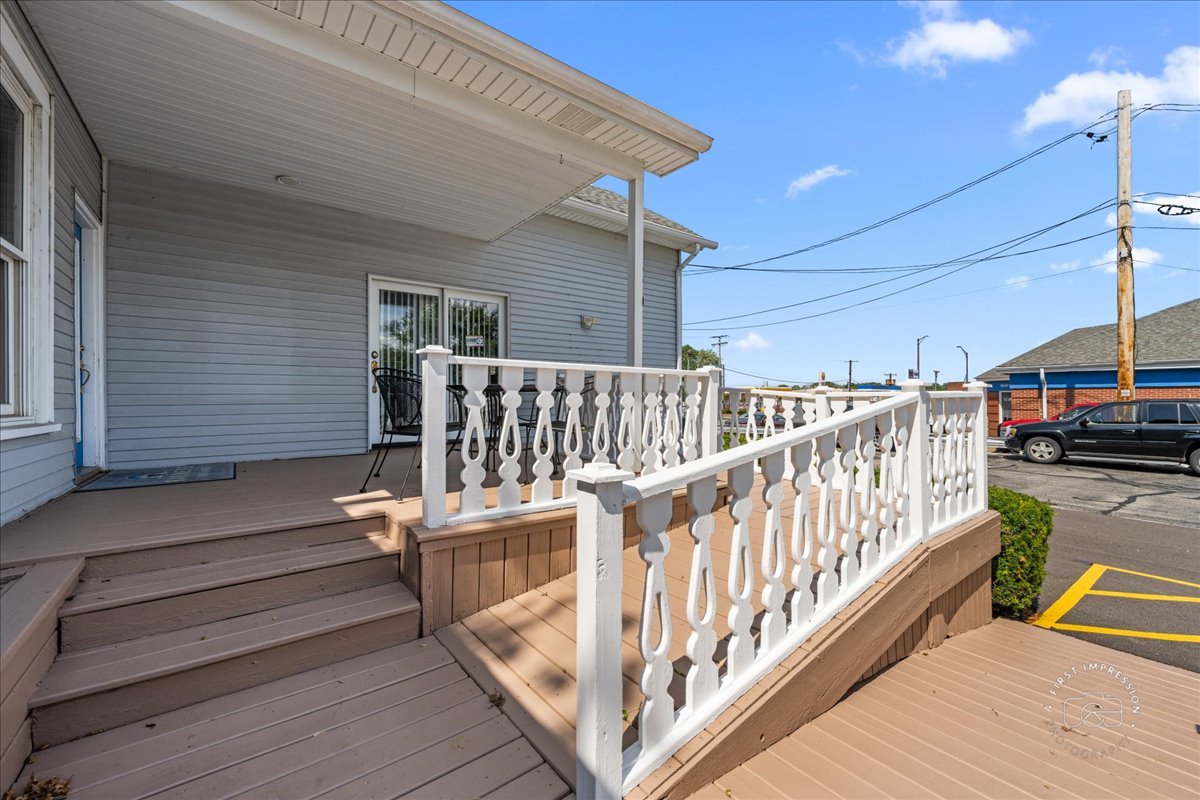 320 Houston Street Batavia, IL 60510 - Photo 3 of 22 a view of balcony with wooden floor and outdoor seating