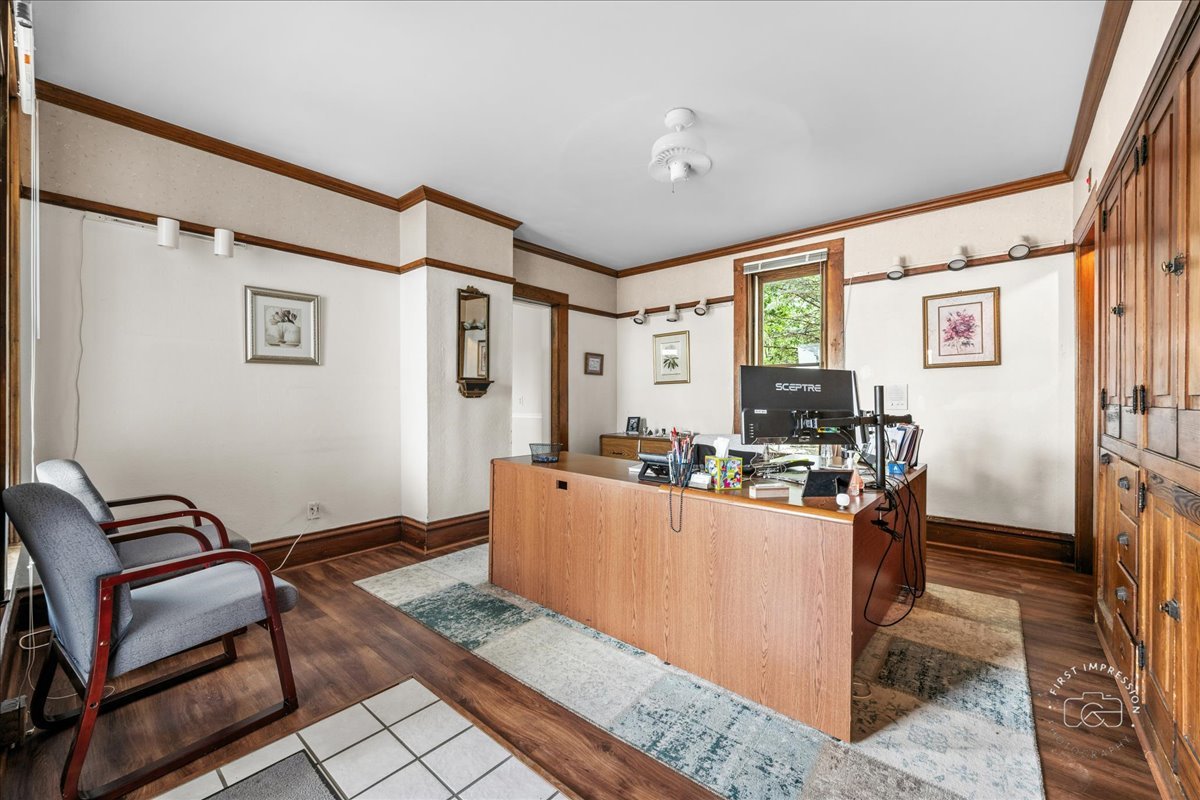 320 Houston Street Batavia, IL 60510 - Photo 8 of 22 a view of a dining room with furniture a rug and wooden floor