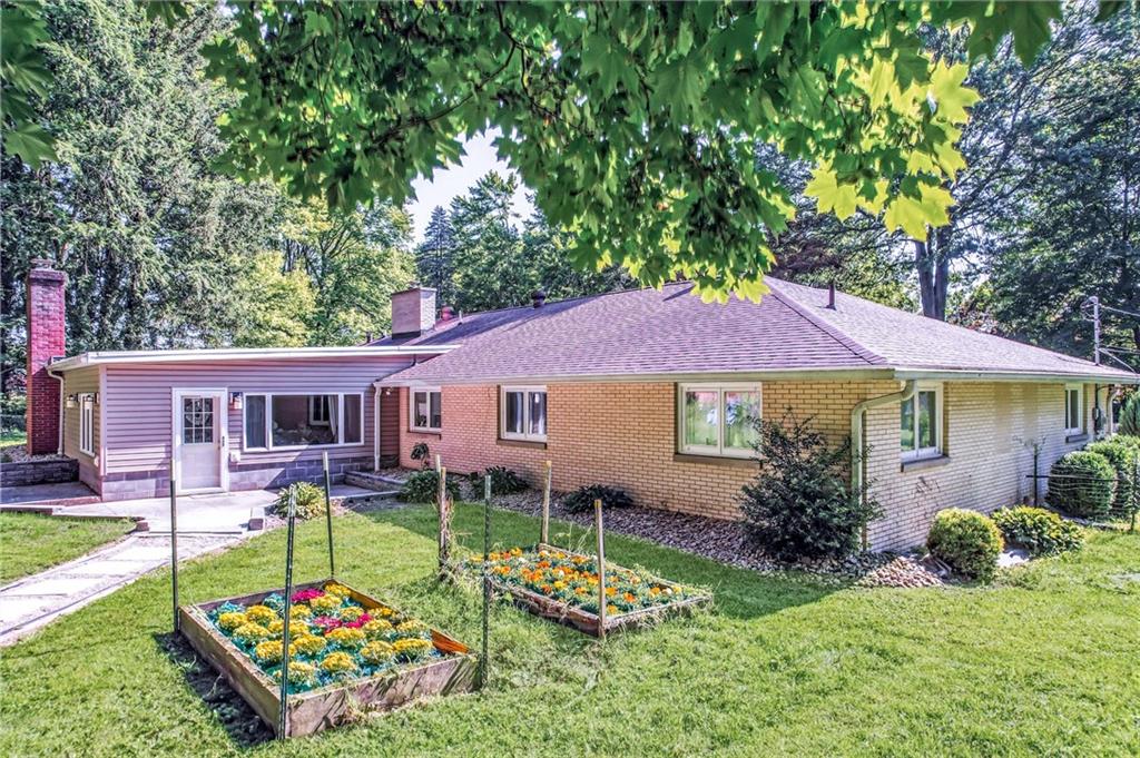 120 Maple Drive Hermitage, PA 16148 - Photo 49 of 49 a front view of a house with garden