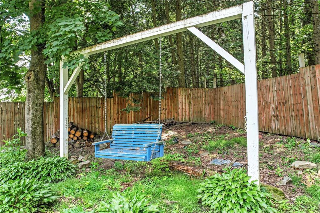 120 Maple Drive Hermitage, PA 16148 - Photo 10 of 49 a backyard of a house with lots of green space