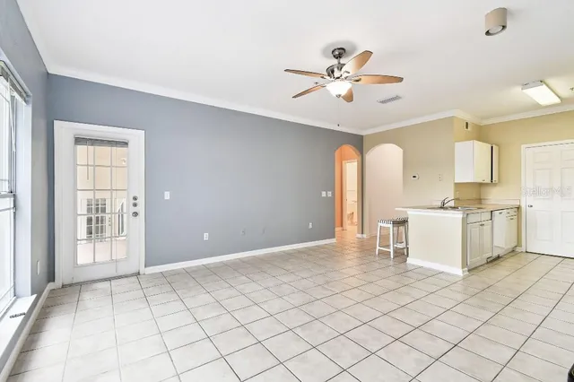 a kitchen with a stove a sink and a microwave
