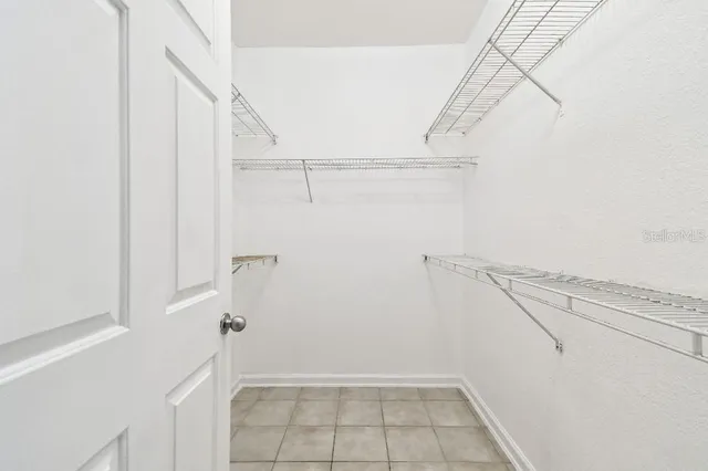 a bathroom with a bath tub and shower curtain