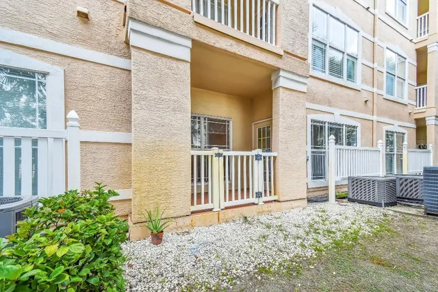 a view of parking garage with cars