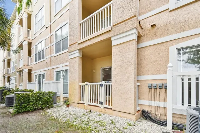 an aerial view of residential building and ocean