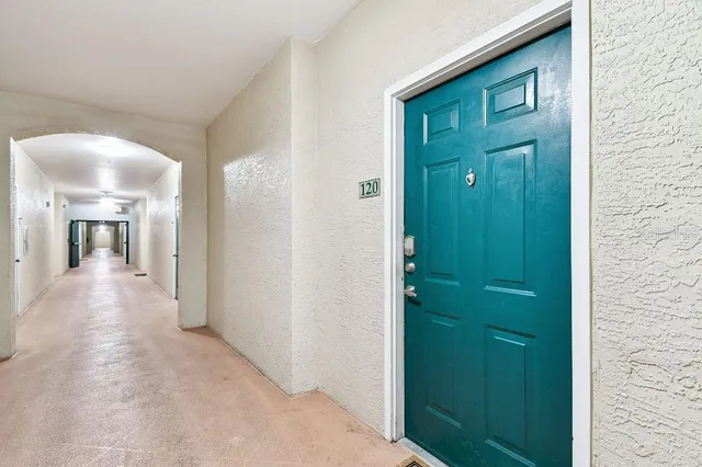 a kitchen with stainless steel appliances a stove a sink dishwasher and a refrigerator