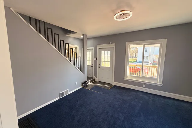 an empty room with windows