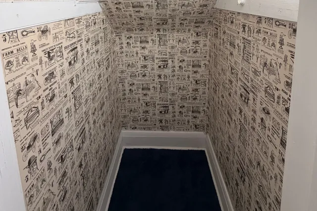 a bathroom with a shower curtain