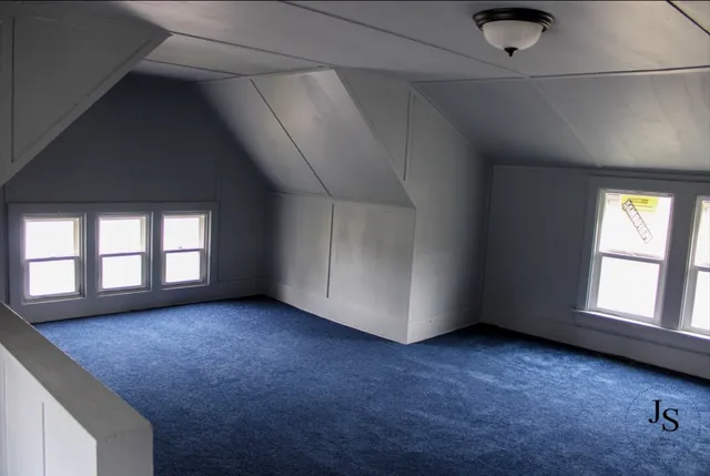 a view of residential houses with outdoor space