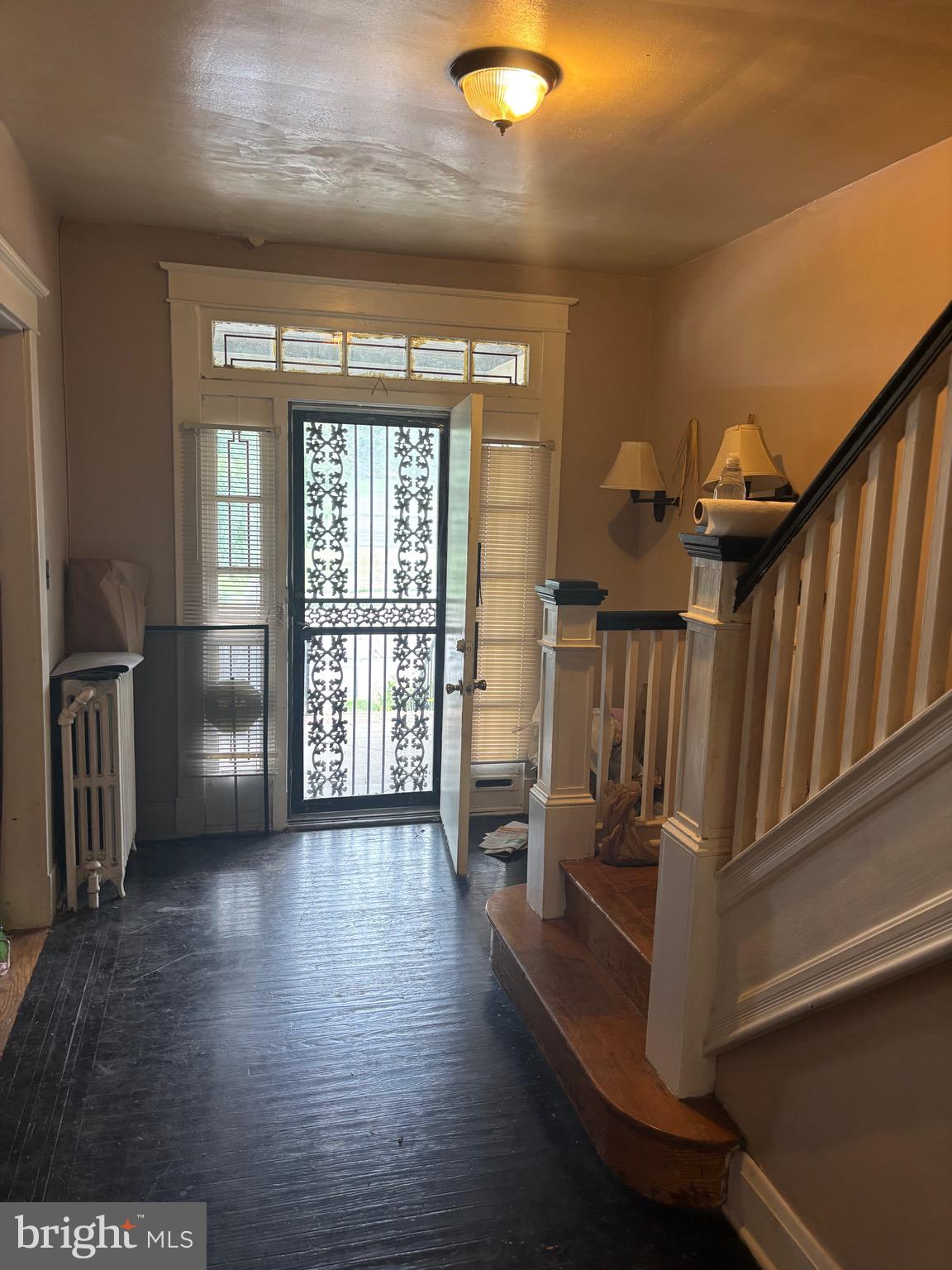 2417 North Pulaski Street Baltimore, MD 21217 - Photo 3 of 26 a view of entryway with wooden floor