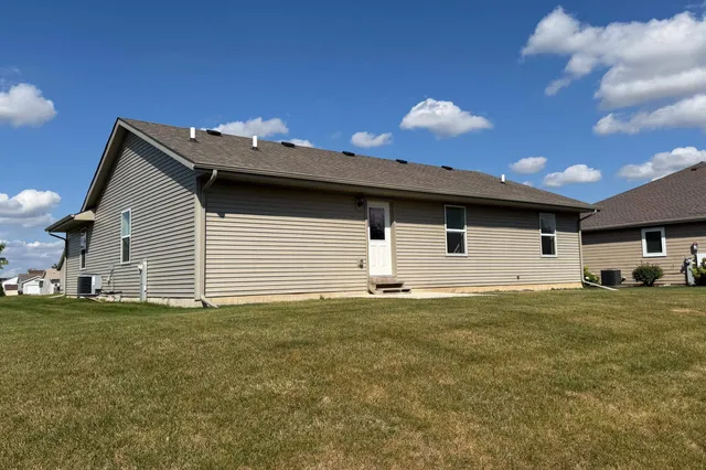 a house view with a backyard space